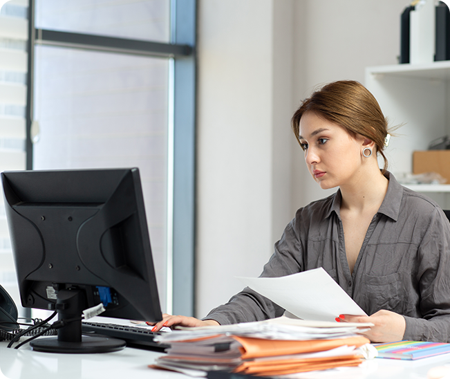 Professional working at computer managing business operations